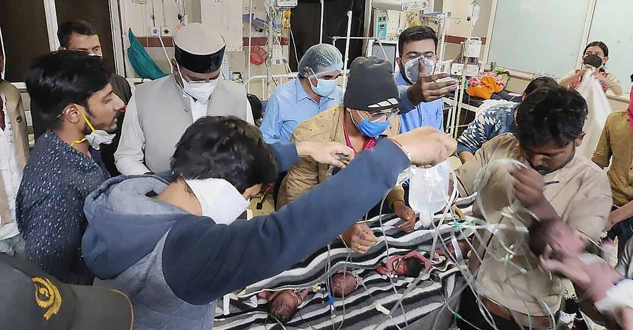 Infants being shifted to other wards after a fire erupted in the Paediatric Intensive Care Unit at Government Kamal Nehru hospital in Bhopal, Monday night, Nov 8, 2021. PTI