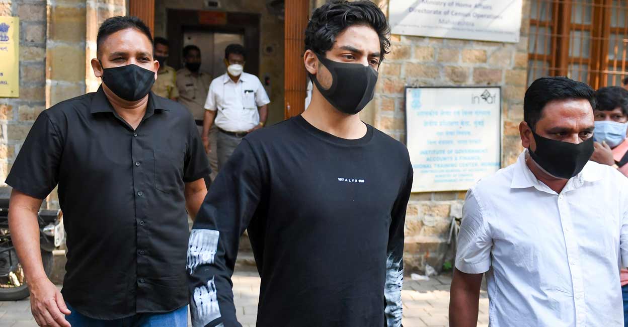 Aryan Khan, son of Bollywood actor Shahrukh Khan, leaves the NCB office after marking his attendance as part of bail conditions in a drugs case in Mumbai, Friday, Dec. 10, 2021. Photo: PTI