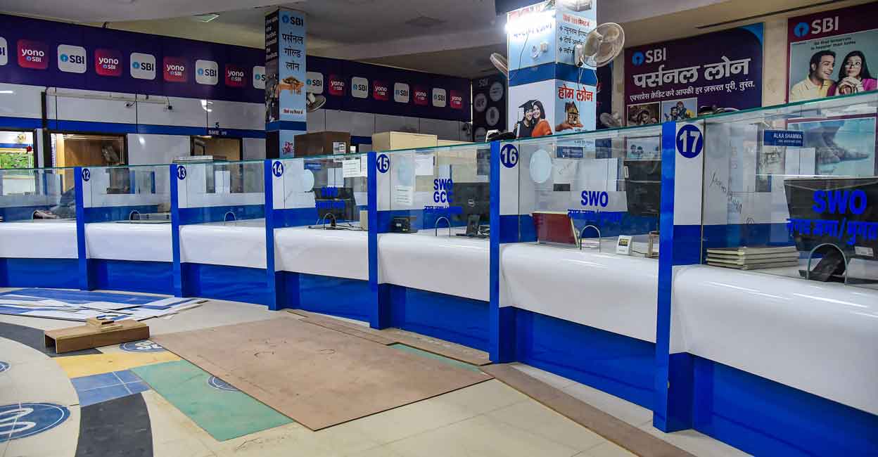 A branch of State Bank of India (SBI) wears a deserted look during nationwide strike called by the United Forum of Bank Unions (UFBU) against privatizaton of the public sector banks, in Bikaner, Thursday, Dec. 16, 2021. PTI