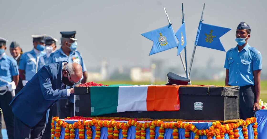 IAF chopper crash: Group Captain Varun Singh cremated with full military honours in Bhopal Retired Col P K Singh, father of late Group Captain Varun Singh, pays tribute to the mortal remains of his son during a wreath laying ceremony at Yelahanka Air Force station in Bengaluru, Thursday, Dec. 16, 2021. Photo: PTI/Shailendra Bhojak