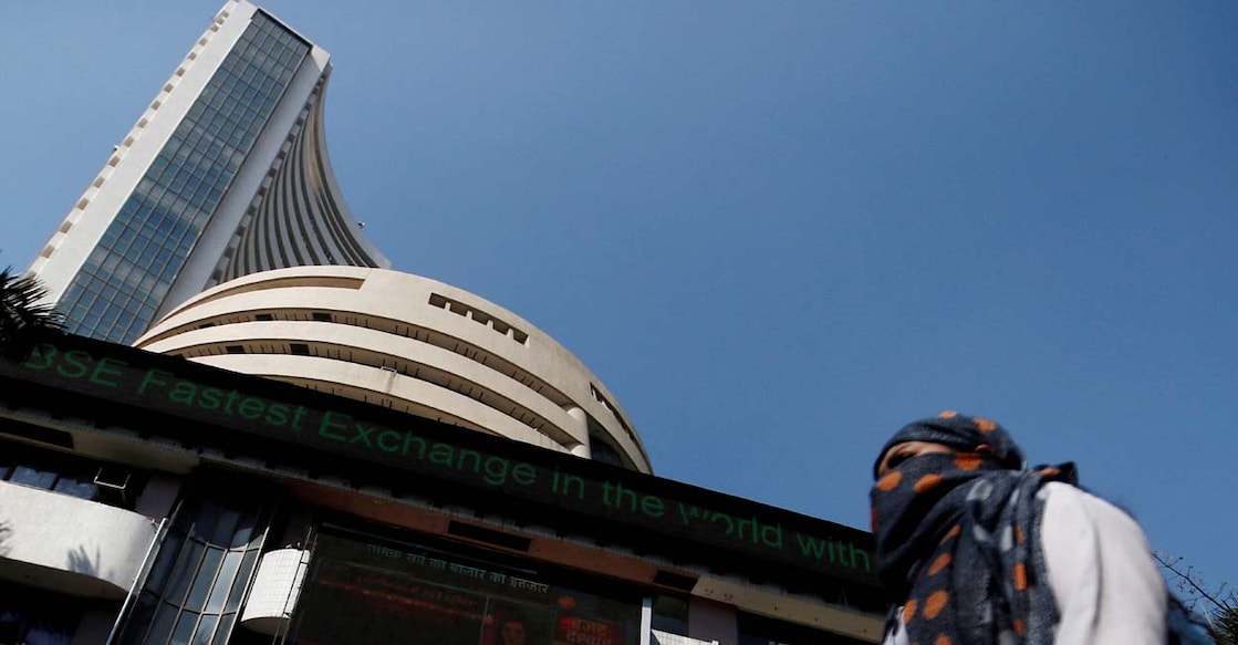 A woman walks past the Bombay Stock Exchange (BSE) building in Mumbai, January 31, 2020. File Photo: REUTERS/Francis Mascarenhas/