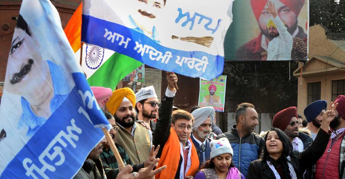 Aam Aadmi Party supporters celebrate party's victory in Chandigarh Municipal Corporation Elections. Photo: PTI