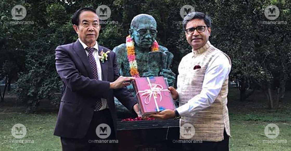 Vikram Misri (right) garlanded the statue of Mahatma Gandhi on his 151st birth anniversary, at a popular park in Beijing on October 2, 2020. File Photo: PTI
