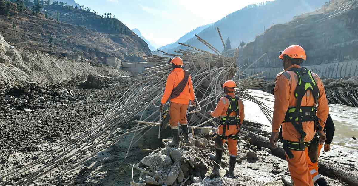 NDRF personnel carry out rescue and restoration work at damaged Tapovan barrage