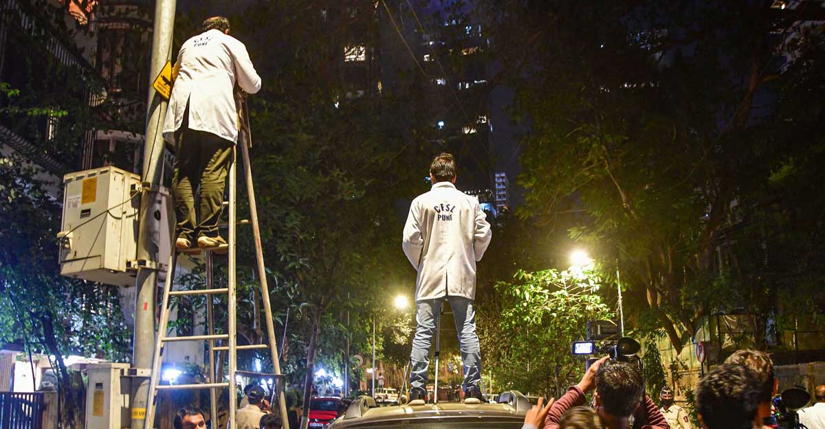 Mumbai Central Forensic Science Laboratory, Pune (CFSL) and NIA forensic experts while recreating the crime scene by taking suspended API Sachin Vaze to the spot where the explosive-laden Scorpio was found outside Antilla on February 25, in Mumbai, Saturday, March 20, 2021. (PTI Photo)