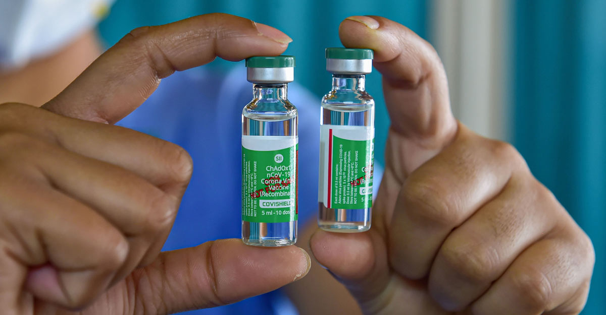 A health worker displays vials of COVID-19 vaccine at a private hospital, during the second phase of countrywide inoculation drive, in Bengaluru, Monday, March 1, 2021. Photo: PTI