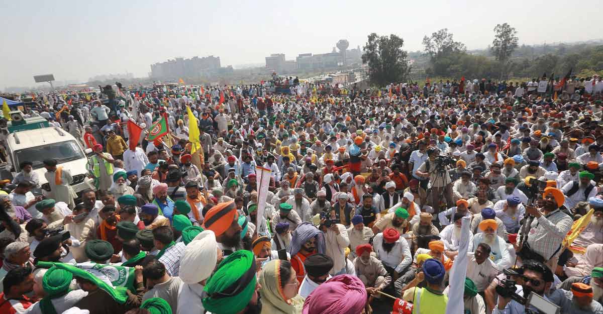 PTI03_06_2021_000137B Farmers block a highway to mark 100 days of their ongoing protests against new farm laws, along the Delhi-Haryana border near New Delhi. Photo: PTI