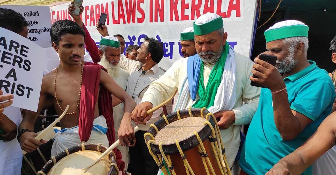 BKU Spokesperson Rakesh Tikait takes part in a 'chenda melam' with protestors from Kerala BKU Spokesperson Rakesh Tikait takes part in a 'chenda melam' with protestors from Kerala