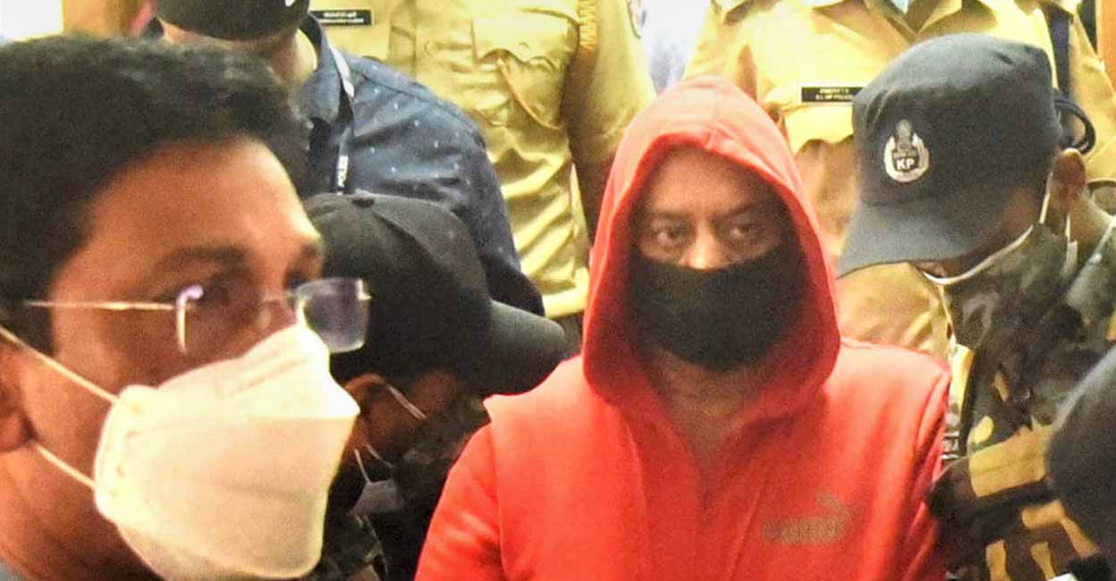 Ravi Pujari, accused in the Kochi beauty parlour shooting case, brought out after his hearing in Ernakulam CJM court in Kochi. PTI