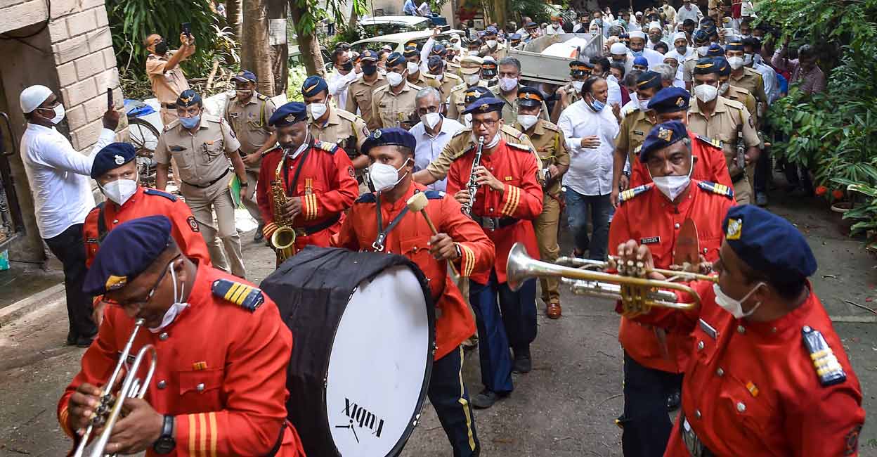 Dilip Kumar's funeral State honour being accorded to Bollywood actor Dilip Kumar during his funeral, in Mumbai, Wednesday, July 7, 2021. Photo: PTI/Kunal Patil