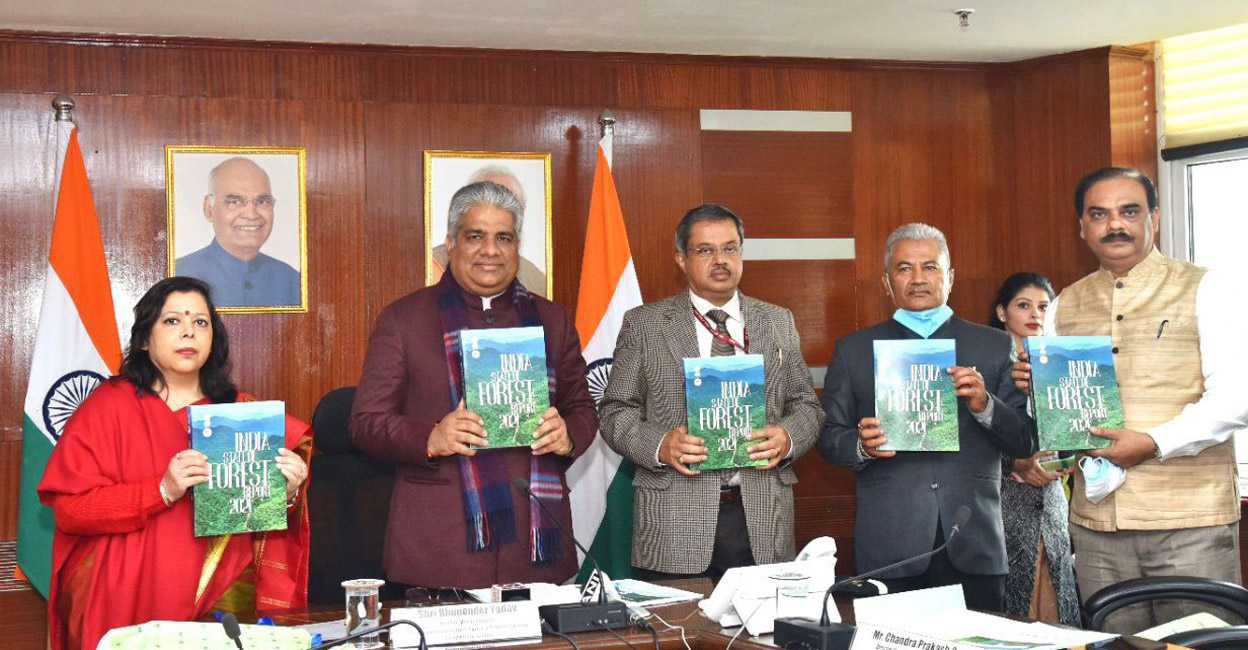 Minister for Environment, Forest and Climate Change, Bhupender Yadav, releases the ‘India State of Forest Report 2021’. Photo: Twitter/Bhupender Yadav
