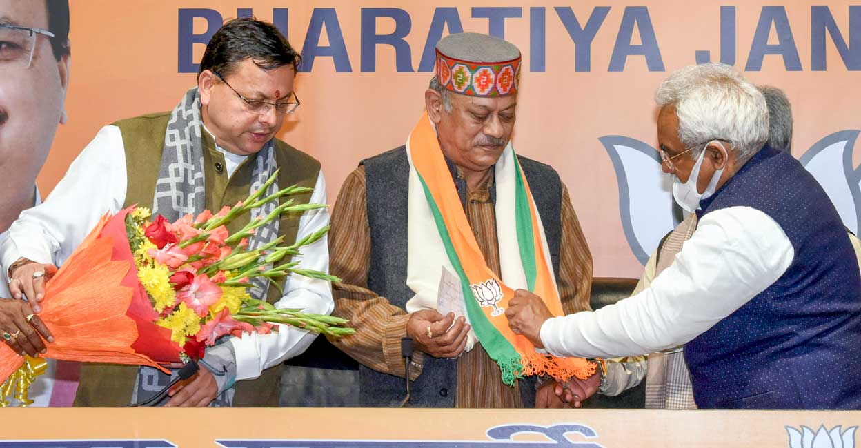 Colonel Vijay Rawat (retired), younger brother of late CDS General Bipin Rawat joins BJP in the presence of Uttarakhand CM Pushkar Singh Dhami ahead of Uttarakhand Assembly polls, in New Delhi, Wednesday, Jan 19, 2022. Photo: PTI