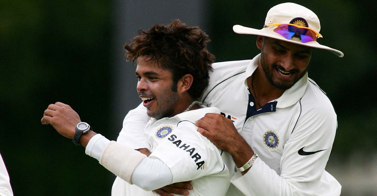 Sreesanth S Sreesanth with teammate Harbhajan Singh. Photo: Alexander Joe/AFP