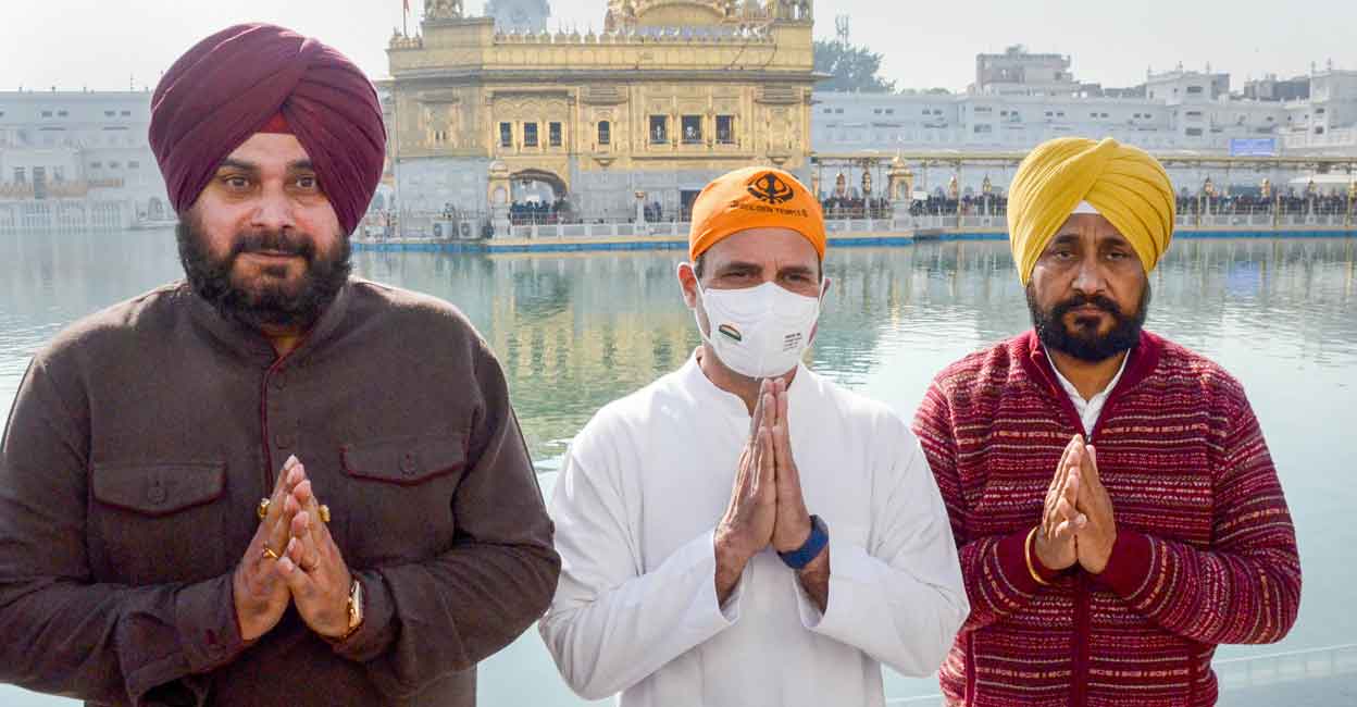 Congress leader Rahul Gandhi with Punjab CM Charanjit Singh Channi and PPCC President Navjot Singh Sidhu at Golden Temple in Amritsar, Thursday, Jan. 27, 2022. PTI