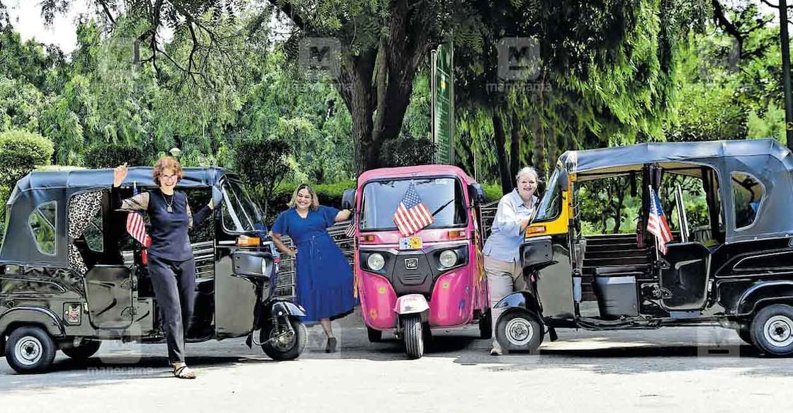 Anne Mezon, Ruth Homberg, and Sherin Kitterman with their autorickshaws: Rahul R Pattom