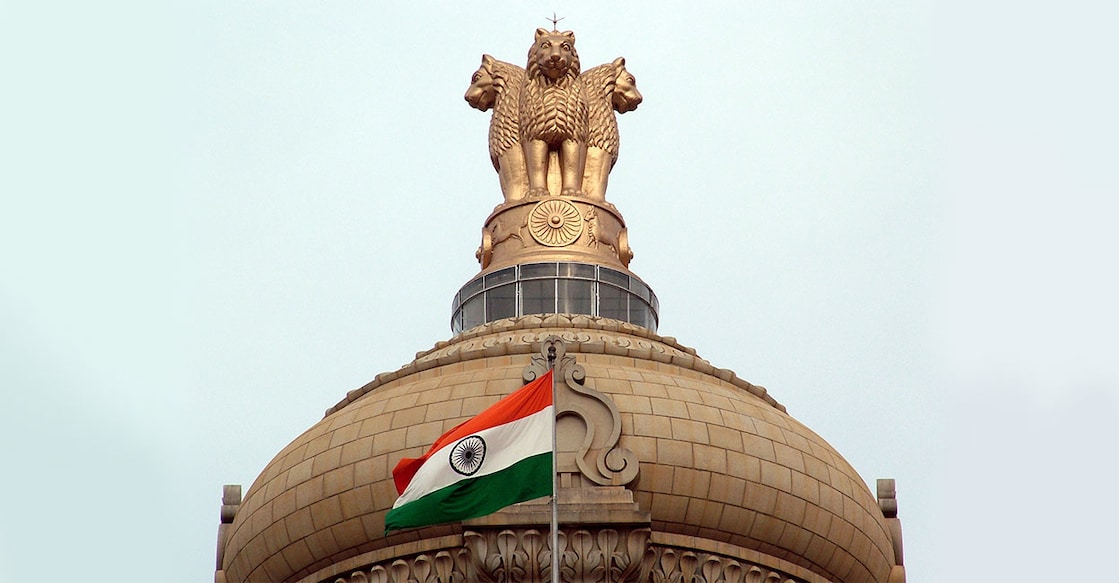 Indian National Emblem & Flag. Photo: ARAVIND TEKI/Shutterstock