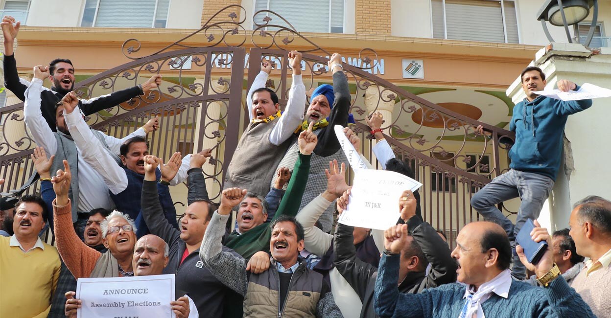 Aam Aadmi Party (AAP) members stage a protest demanding immediate elections for the J&K Assembly, in front of the State Election Commission office, in Jammu | Photo: PTI