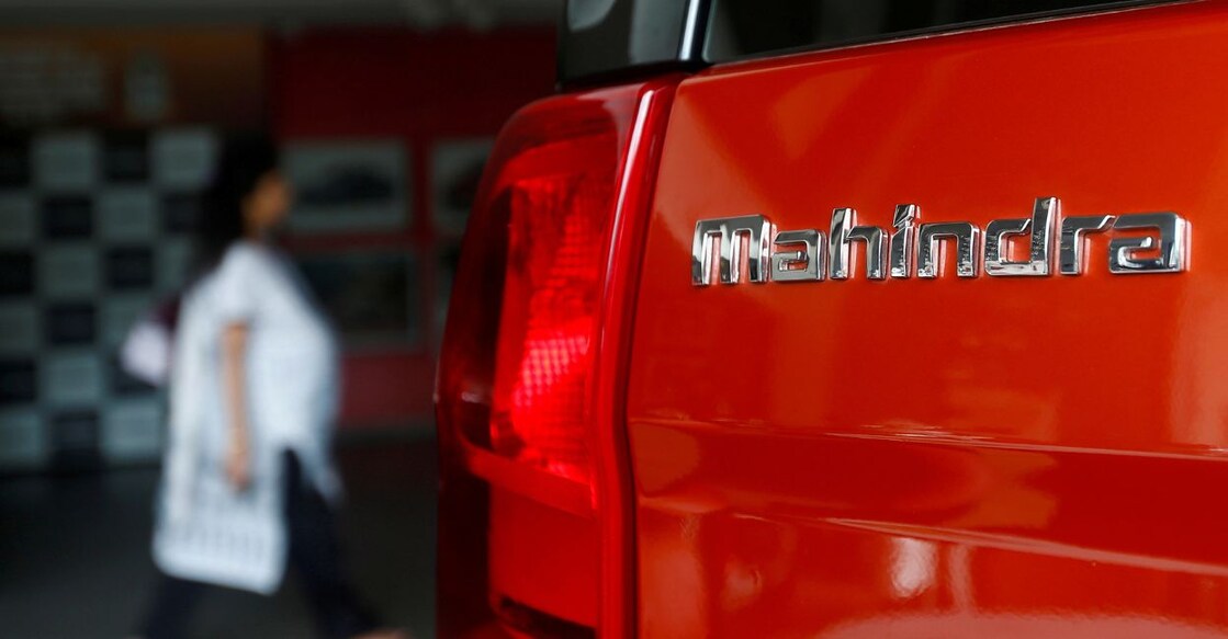 An employee walks past a Mahindra TUV300 car at a showroom in Mumbai, India, August 30, 2016. Representative image/Reuters 