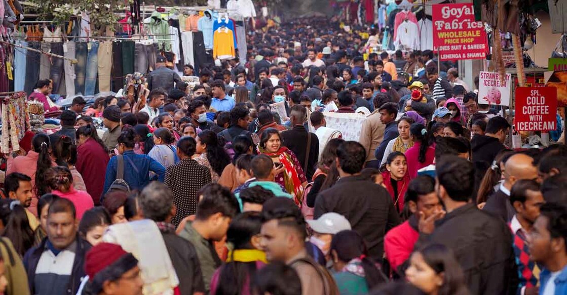 Umasked at the time of Covid: People without wearing face mask gather at Sarojni Nagar Market, in New Delhi, Wednesday, Dec. 21, 2022.  Photo: PTI