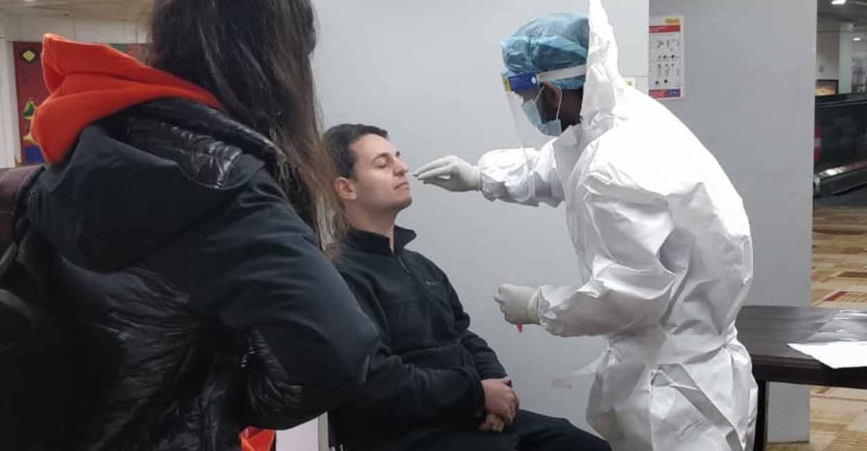An image shared by union health minister of COVID testing at an airport. Photo: Twitter/ @mansukhmandviya
