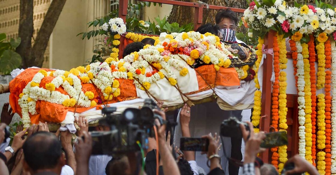 Mortal remains of music composer Bappi Lahiri is placed in a vehicle during his funeral, in Mumbai, Thursday, Feb. 17, 2022. Photo: Kunal Patil/PTI
