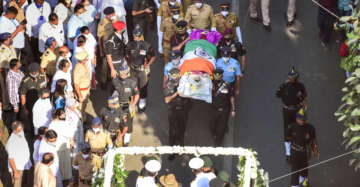 PTI02_06_2022_000165A Funeral procession of Lata Mangeshkar leaves from her residence, in Mumbai, Sunday, Feb. 06, 2022. Photo: PTI