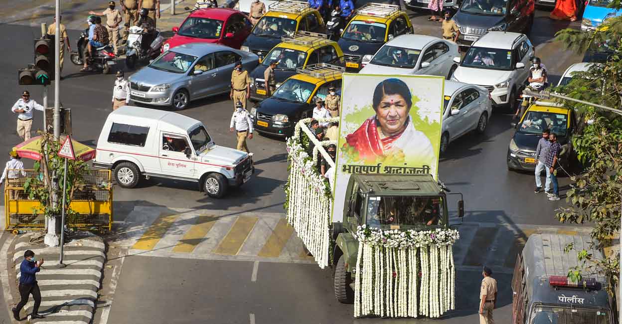 PTI02_06_2022_000167A Funeral procession of Lata Mangeshkar leaves from her residence, in Mumbai, Sunday, Feb. 06, 2022. Photo: PTI