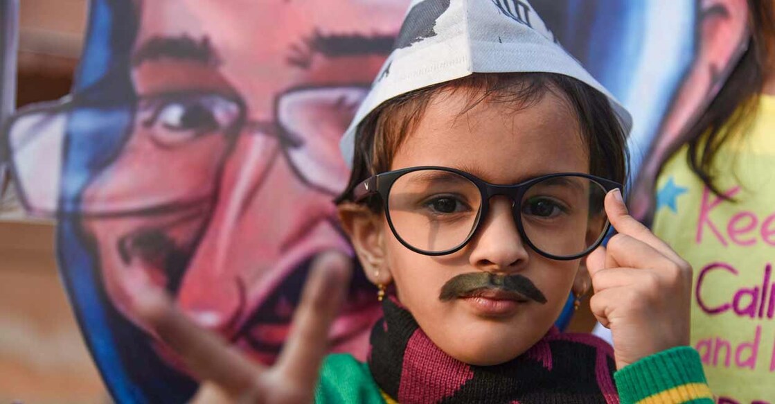 Aam Admi Party (AAP) supporters celebrate the party's win in Punjab Assembly elections, at Shivaji Maharaj Chowk Vashi, in Navi Mumbai, Thursday, March 10, 2022. PTI