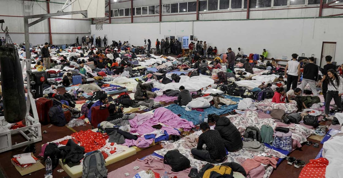 Indian students that fled Ukraine rest in a sports hall in Voluntari, Ilfov, near Bucharest, Romania, February 28, 2022. Photo: Inquam Photos/Octav Ganeavia/Reuters