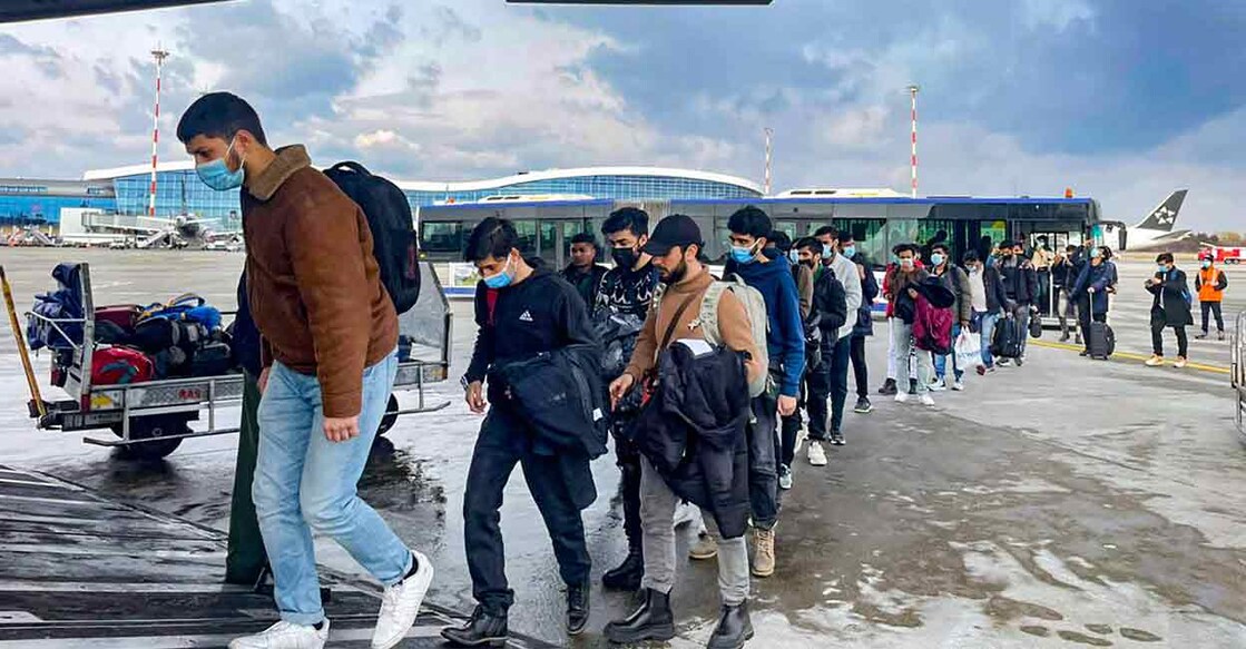 Indian nationals, evacuated from war-torn Ukraine, board an IAF C-17 Globemaster plane in Bucharest to return to India on Thursday. Photo: PTI