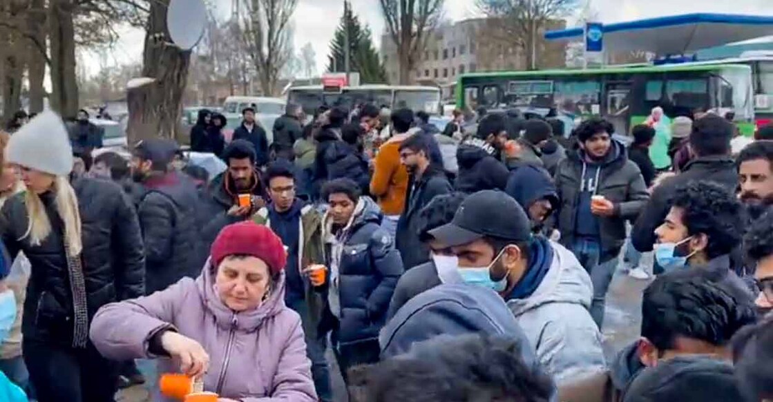 Indian students who were stranded in Sumy, on their way to Poltava, amid Russia-Ukraine conflict, in Ukraine. Students will board trains to western Ukraine from Poltava. (PTI Photo)
