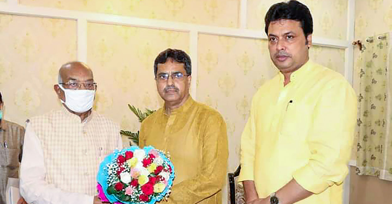 BJP leader Manik Saha (centre) meets Tripura Governor Satyadev Narayan Arya (left) to stake claim to form the government, after being elected as Legislative Party Leader, at Raj Bhavan in Agartala. Former Tripura chief minister Biplab Kumar Deb (right) is also seen. Photo: PTI