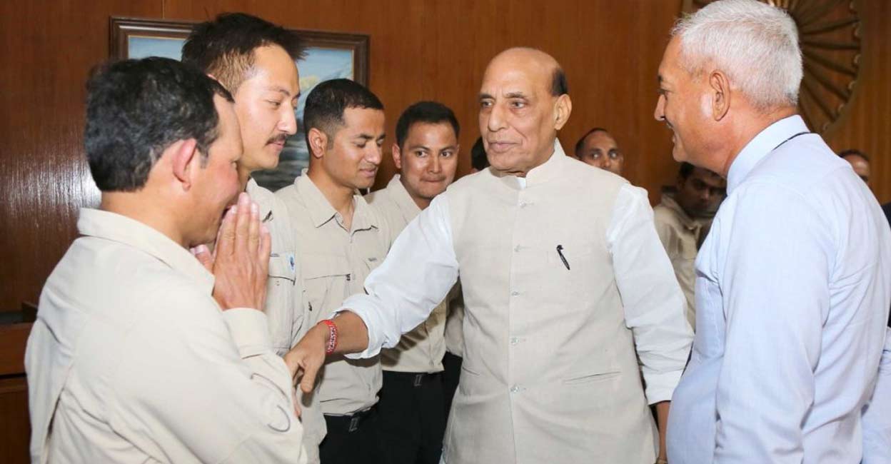 Union Minister of Defence Minister Rajnath Singh with Tiranga Mountain Rescue (TMR) team members.