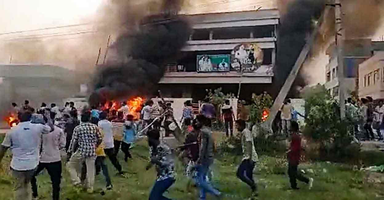 Arsonists outside Andhra Pradesh minister P Viswarupu's house. Photo: Screengrab/ Twitter