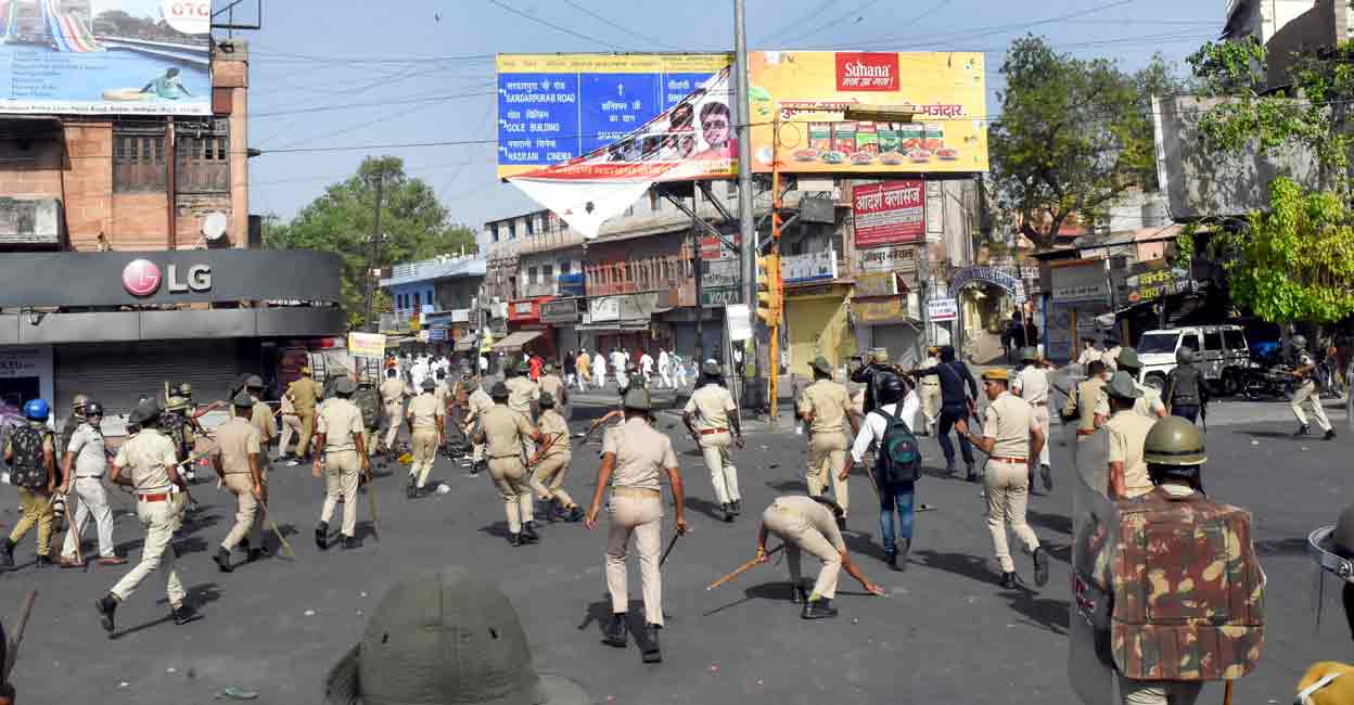 PTI05_03_2022_000153B Police resort to baton charge after clashes broke out between two communities on Eid-ul-Fitr, in Jalori Gate area, in Jodhpur, on Tuesday. PTI
