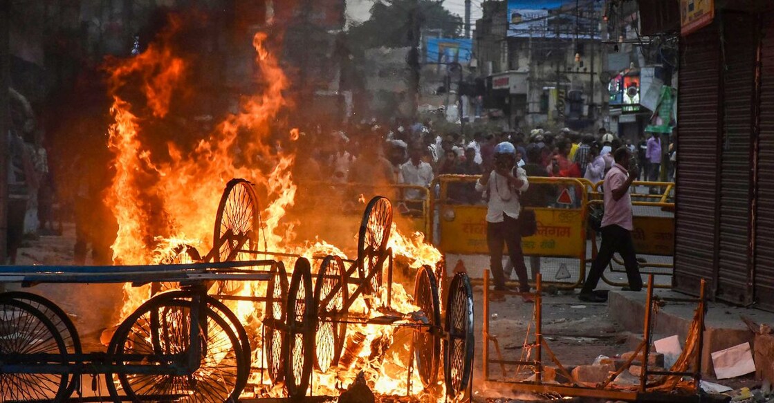 ranchi-protest-1 Carts set on fire by miscreants during a protest over controversial remarks made by two now-suspended BJP leaders about Prophet Mohammad, in Ranchi, Friday, June 10, 2022. PHOTO: PTI