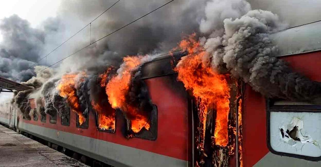 Lakhisarai: Vikramshila Express train set on fire by a mob in protest against the Centre's 'Agnipath' scheme, in Lakhisarai, Friday, June 17, 2022. (PTI Photo)