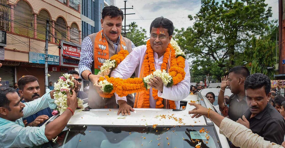 Tripura Chief Minister & BJP candidate Manik Saha with supporters at a road show after winning from Town Bardowali seat, during Tripura Assembly by-elections, in Agartala, Sunday, June 26, 2022. Photo: PTI