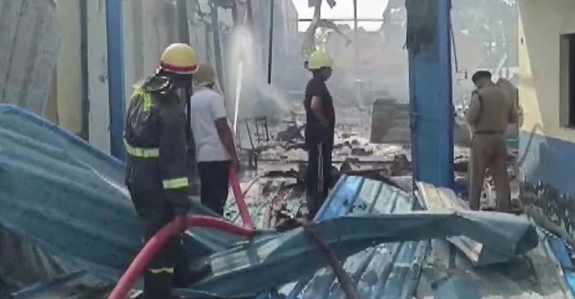 In this photograph released by ANI, fire fighters can be seen dousing the fire inside the factory. 