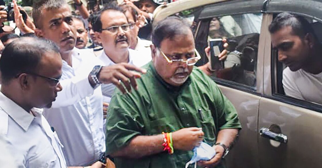 West Bengal Minister Partha Chatterjee being produced at a court after he was arrested by ED officials in connection with its investigation into the teacher recruitment scam, in Kolkata, Saturday, July 23, 2022. PHOTO: PTI
