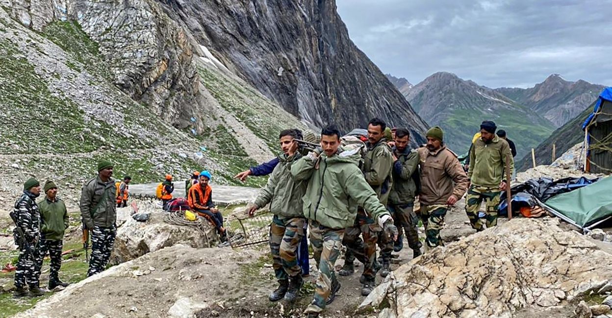  Indian Army personnel during a rescue operation, a day after a supposed cloudburst in Amarnath. PHOTO: PTI