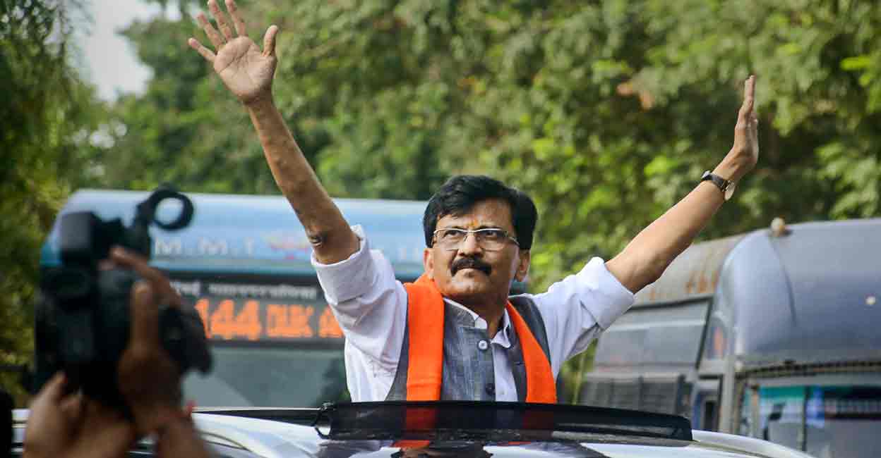 PTI07_31_2022_000209A Shiv Sena MP Sanjay Raut being taken to the Enforcement Directorate (ED) office in connection with a money laundering case, in Mumbai, Sunday, July 31, 2022. Photo: PTI