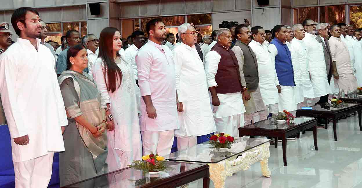 Bihar Chief MInister Nitish Kumar with Deputy CM Tejashwi Yadav and other leaders during the swearing-in ceremony at the Raj Bhavan, in Patna, Wednesday, Aug. 10, 2022. Photo: PTI