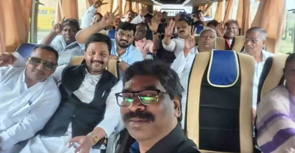 Jharkhand CM Hemant Soren with UPA MLAs leaves from the CM residence in a bus after a meeting, amid speculation of his disqualification, in Ranchi on Saturday, Aug. 27, 2022. Photo: PTI