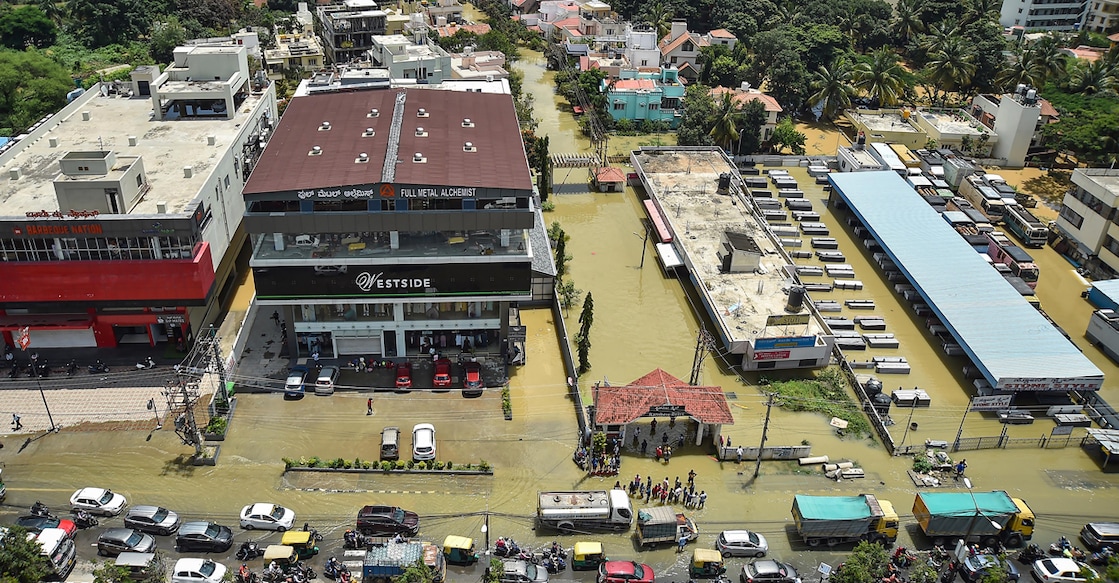 An aerial view of flooded Rainbow Drive Layout after heavy monsoon rains at Sarjapur, in Bengaluru, Monday, Sept. 5, 2022. Photo: PTI