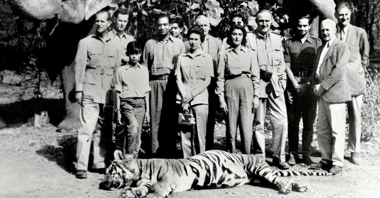 queen-elizabeth-1 In this file photo taken on January 26, 1961, Queen Elizabeth II, standing between the Maharaja and Maharani of Jaipur, with her husband Prince Phillip to the far left, pose with the tiger killed by Prince Phillip in Jaipur. AFP PHOTO/FILES/CENTRAL PRESS