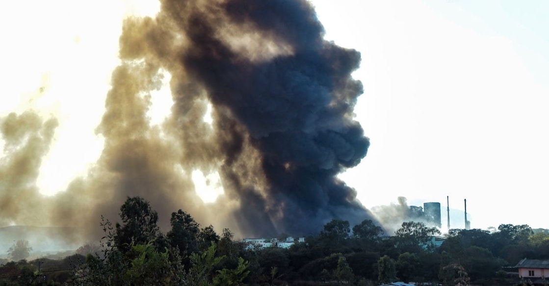 nashik-blast Black smoke rises after a fire broke out at a factory, at Mundegaon village in Nashik, Sunday, January 1, 2023. Photo: PTI