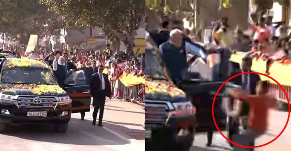 Screengrab of the boy rushing toward PM Narendra Modi's motorcade at Hubballi in Karnataka on Thursday. 