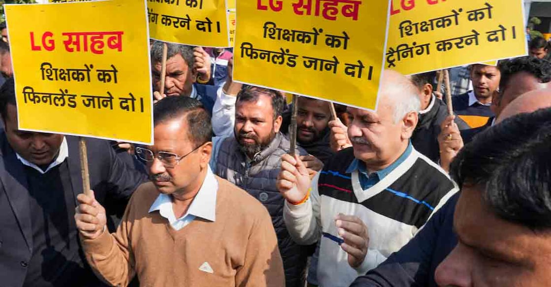 Delhi Chief Minister Arvind Kejriwal with Deputy Chief Minister Manish Sisodia and other AAP MLAs during a protest march towards Delhi Lieutenant Governor VK Saxena's office over his alleged interference in the working of the city government, in New Delhi, Monday, Jan. 16, 2023. Photo: PTI
