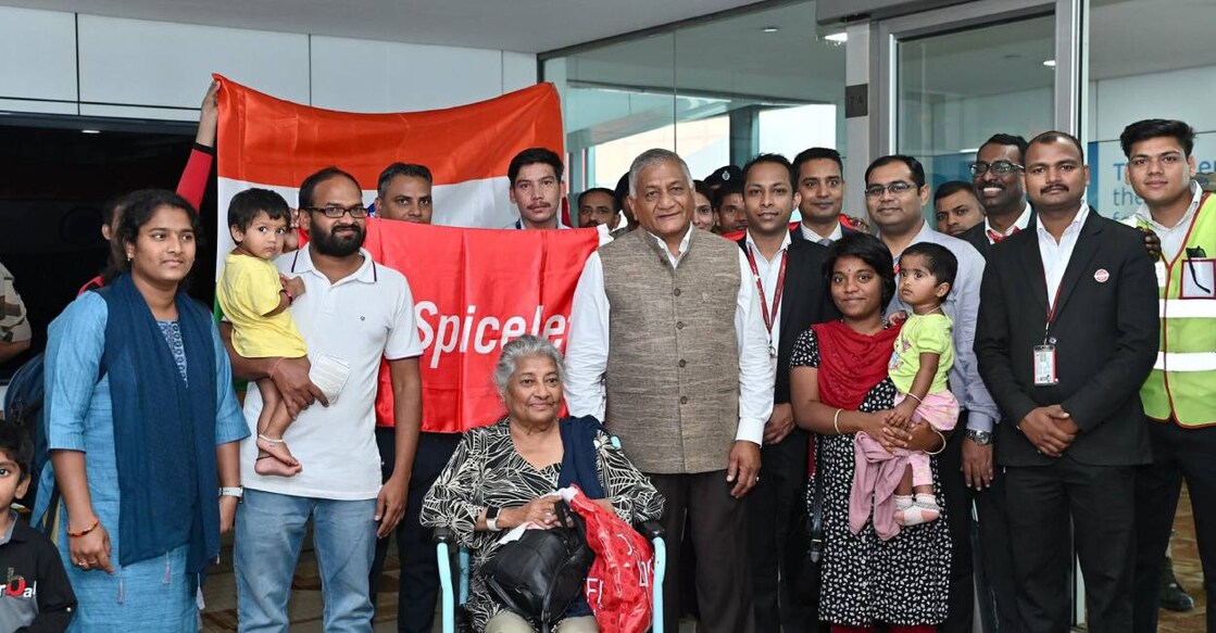 Minister of State for Civil Aviation General Vijay Kumar Singh (retd.) receives the Indian nationals evacuated from Israel under 'Operation Ajay' at New Delhi airport. Photo: PTI